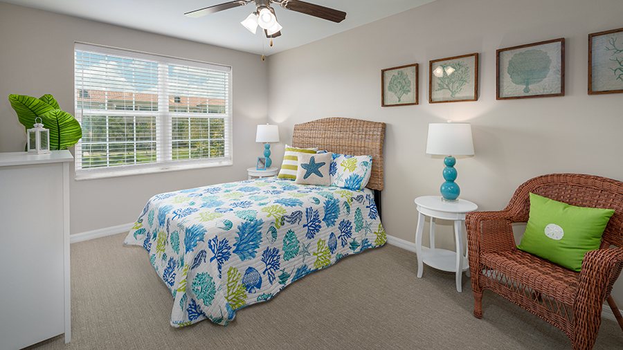 Model bedroom at American House Bonita Springs assisted living and memory care facility
