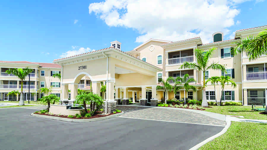 Front driveway and entrance at American House Bonita Springs Independent Living luxury retirement community