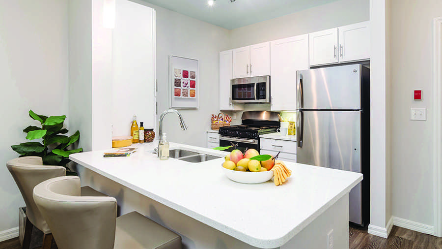 Model kitchen at American House Bonita Springs Independent Living luxury retirement community