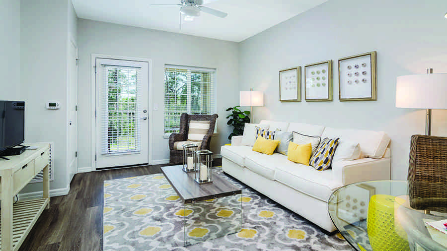 Model living room at American House Bonita Springs Independent Living luxury retirement community