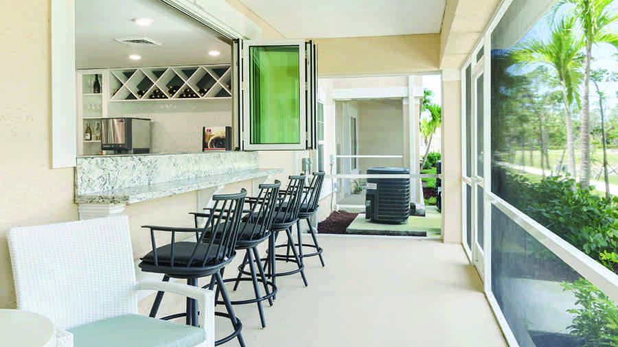 Outdoor patio bar at American House Bonita Springs Independent Living luxury retirement community