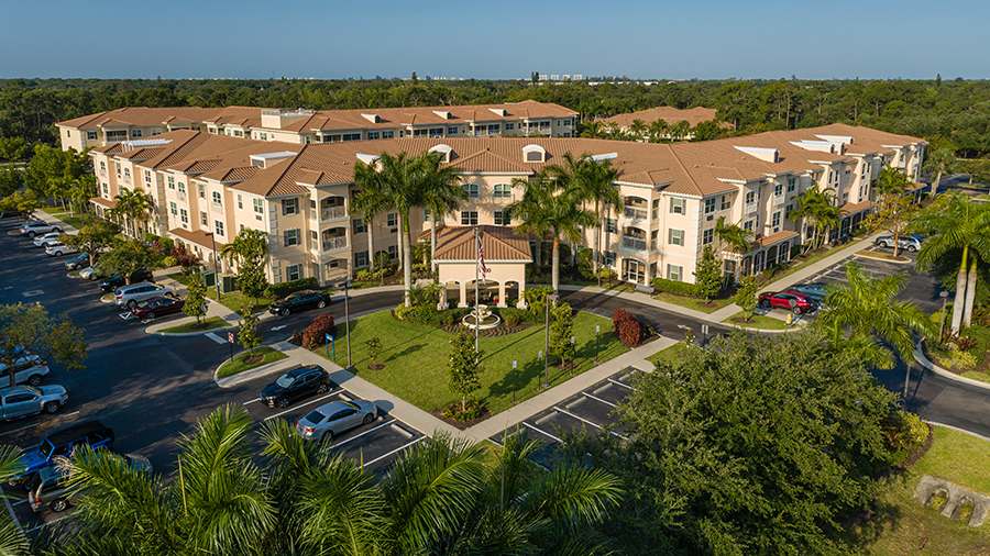 Aerial front view of American House Bonita Springs assisted living and memory care facility