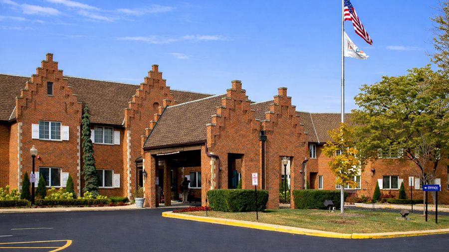 Driveway and entrance at American House East I independent living and assisted living facility in Roseville, MI