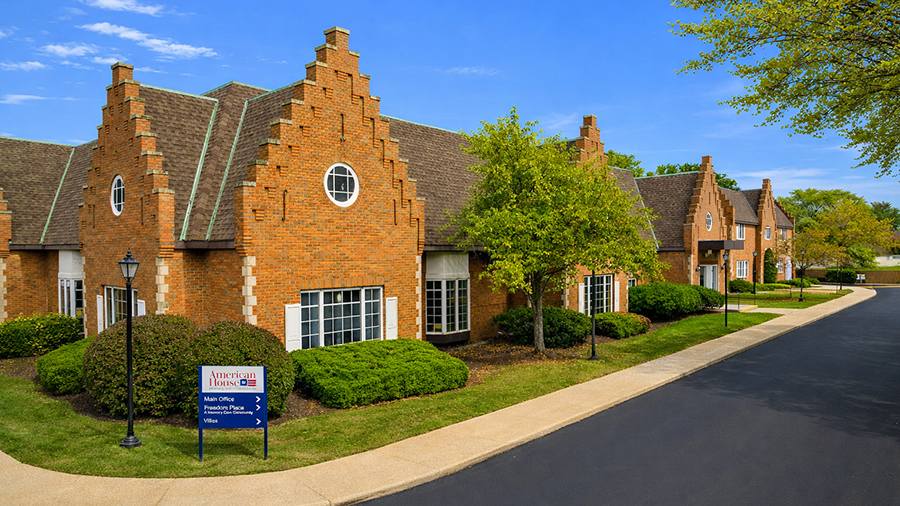 Signage and exterior of American House East I independent living and assisted living facility in Roseville, MI
