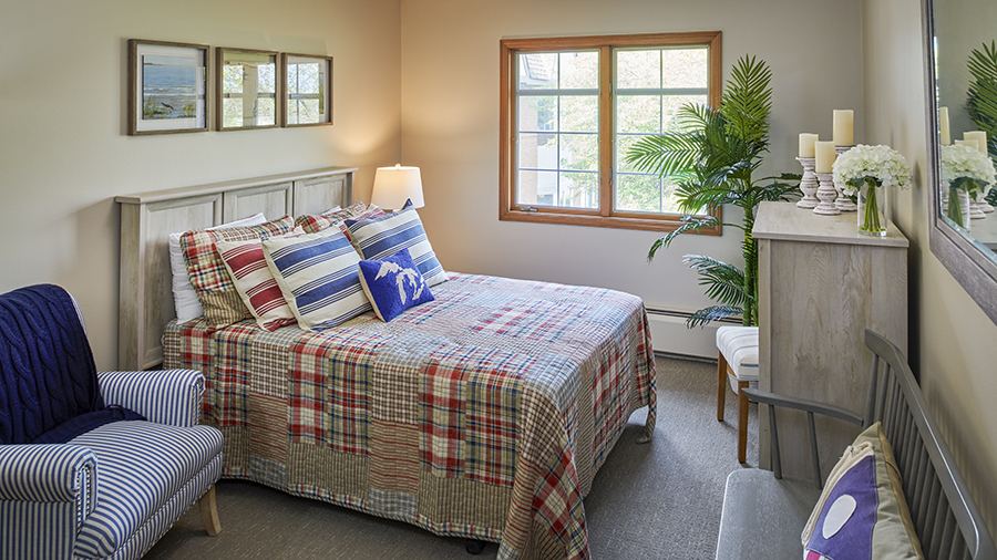 Model bedroom at American House East I independent living and assisted living facility in Roseville, MI