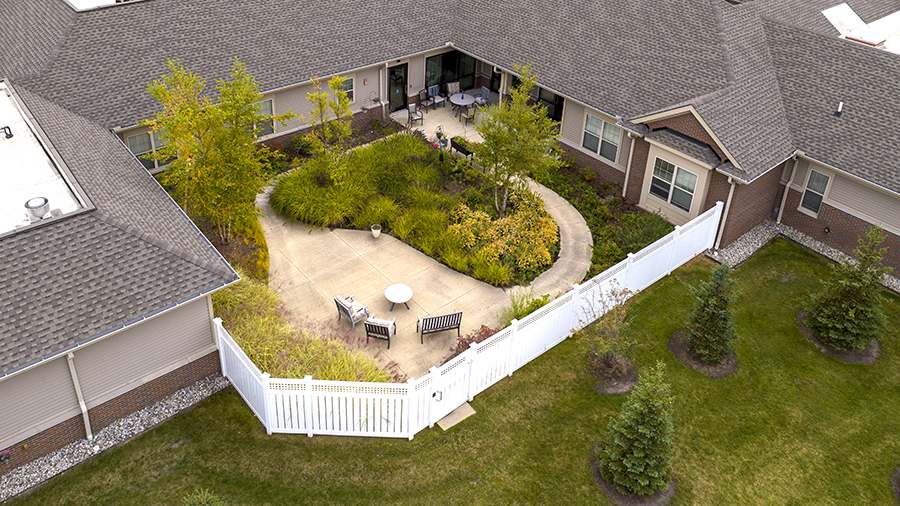 Aerial view of patio at American House Freedom Place Roseville, a memory care community in Roseville, Michigan