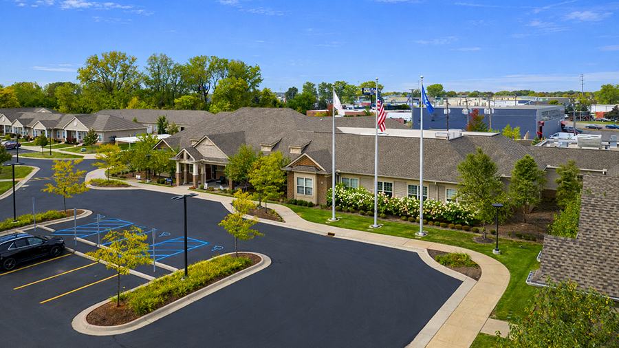 Aerial view of front entrance at American House Freedom Place Roseville, a memory care community in Roseville, Michigan