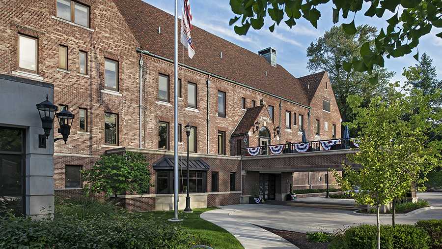 Exterior front entrance of American House Grosse Pointe Cottage Senior Living Facility