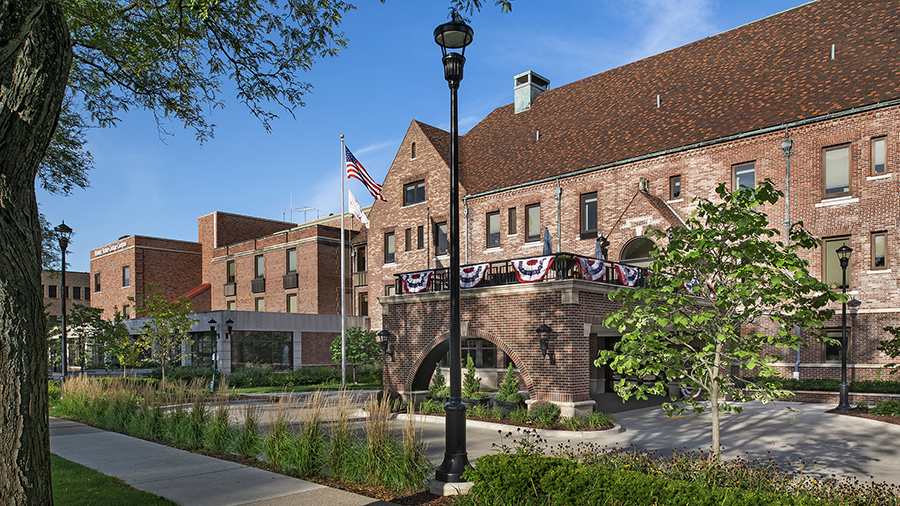 Exterior front of American House Grosse Pointe Cottage Senior Living Facility