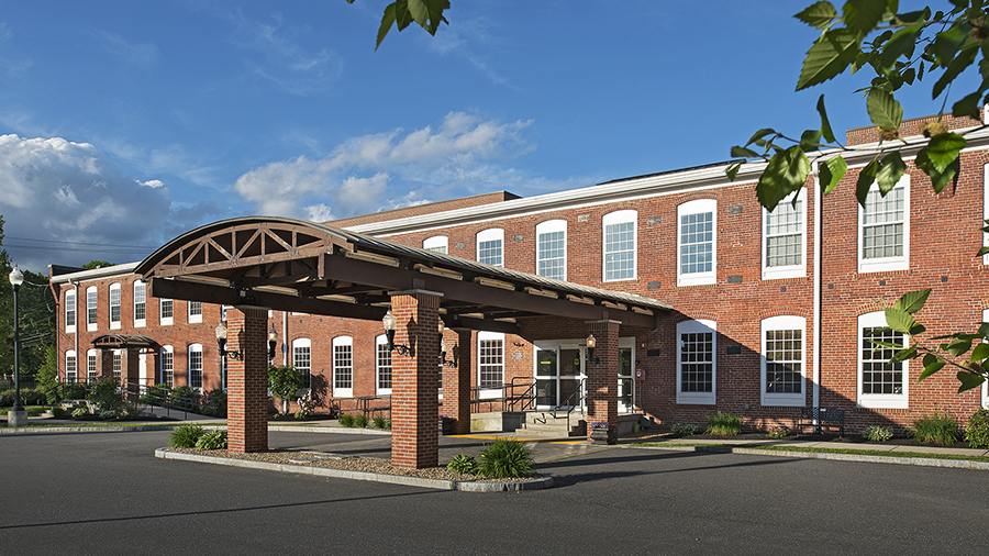 Front entrance at American House Keene senior living community in Keene, NH