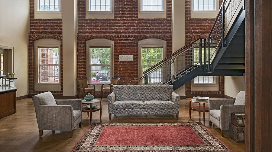 Lobby and sitting area at American House Keene senior living community in Keene, NH