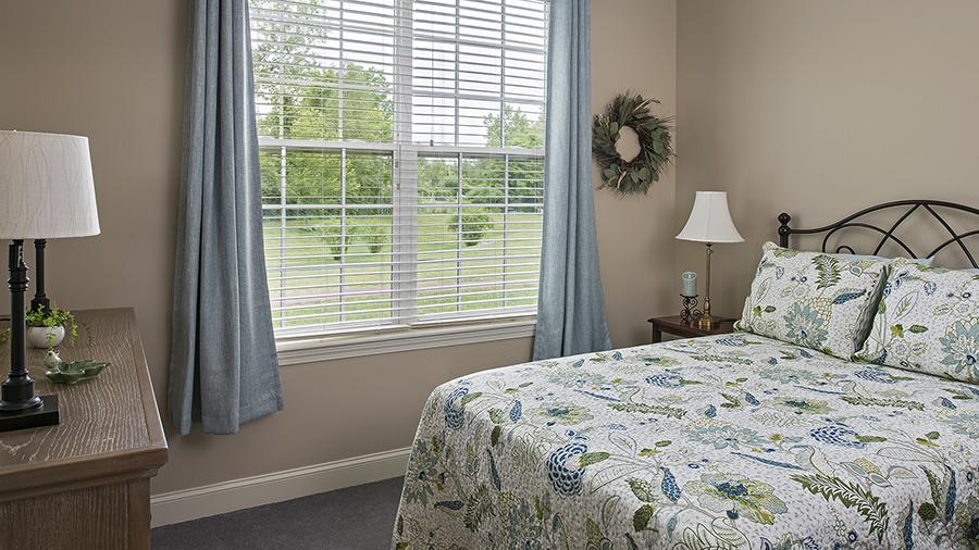 Model bedroom at American House Keene senior living community in Keene, NH