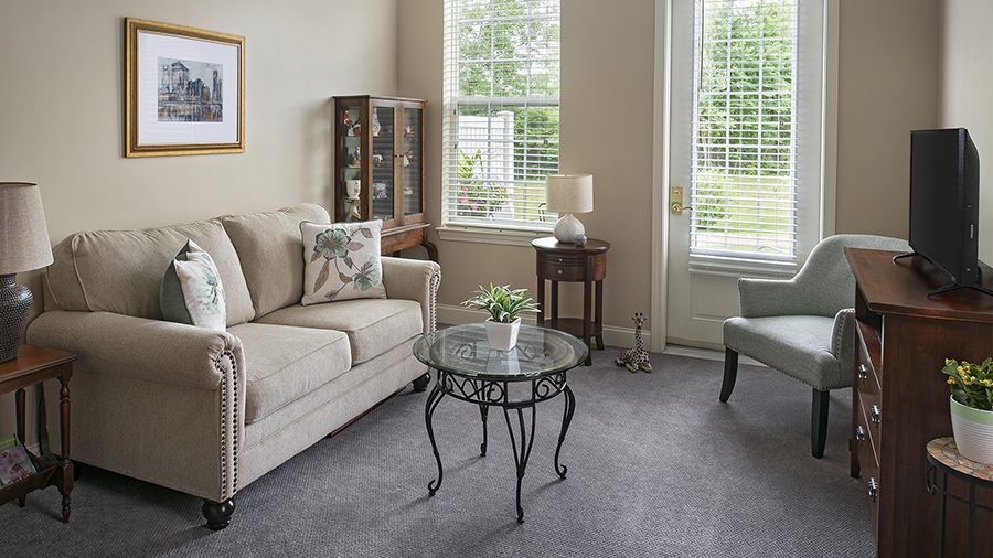 Model living room at American House Keene senior living community in Keene, NH