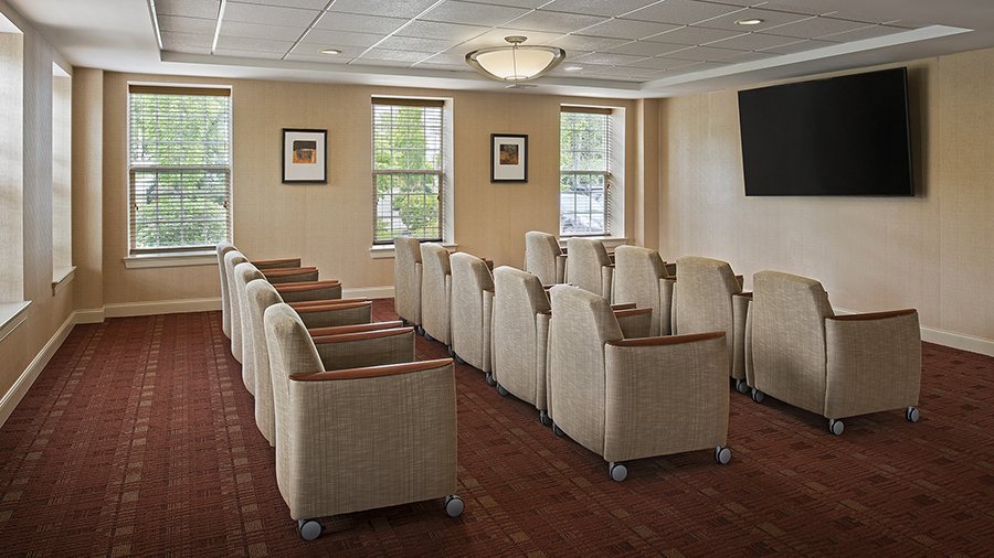 Movie theater at American House Keene senior living community in Keene, NH