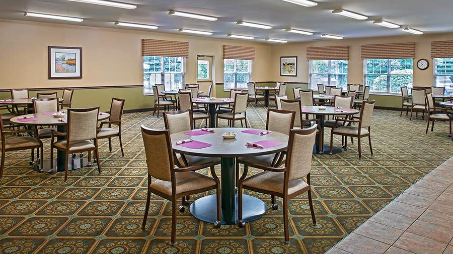 Dining room at American House Riverview Senior Living Facility
