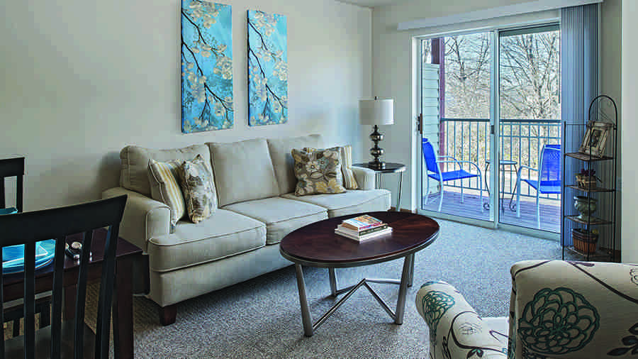 Model living room American House Riverview Senior Living Facility