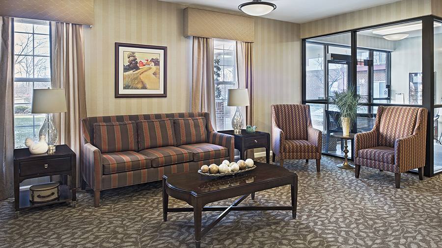 Cozy lobby and sitting area at American House Riverview Senior Living Facility