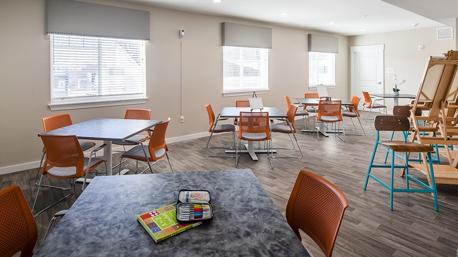 Activities room at American House St. Petersburg Independent Living, Assisted Living, and Memory Care senior living facility in St. Petersburg, FL