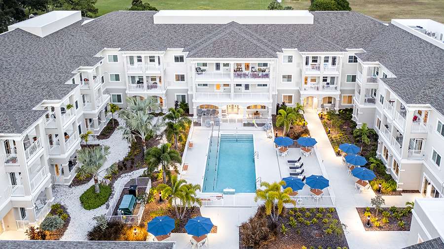 Aerial view of pool at American House St. Petersburg Independent Living, Assisted Living, and Memory Care senior living facility in St. Petersburg, FL