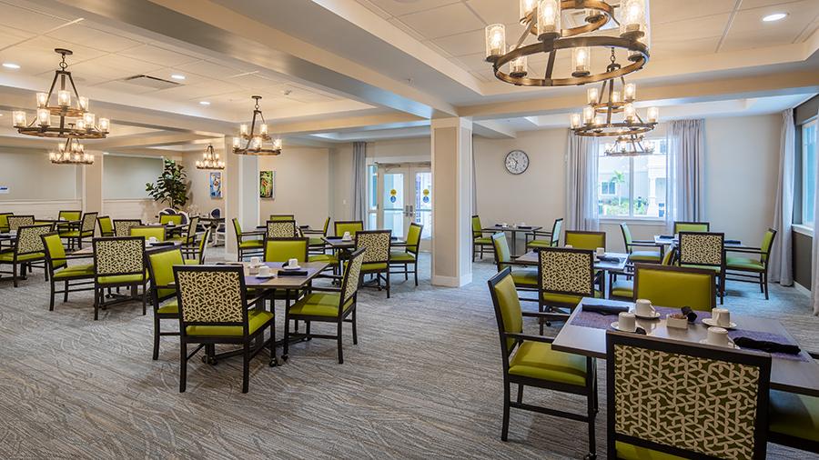 Dining room at American House St. Petersburg Independent Living, Assisted Living, and Memory Care senior living facility in St. Petersburg, FL