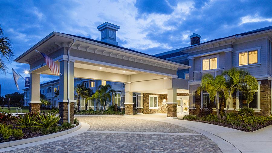 Front entrance of American House St. Petersburg Independent Living, Assisted Living, and Memory Care senior living facility