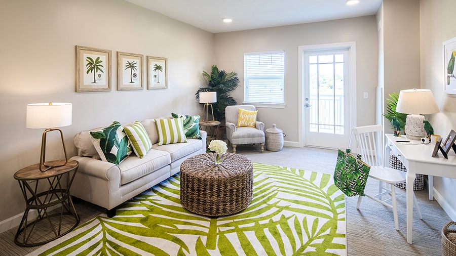 Model living room at American House St. Petersburg Independent Living, Assisted Living, and Memory Care senior living facility in St. Petersburg, FL