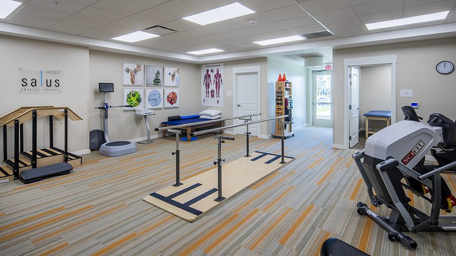 Physical therapy and fitness room at American House St. Petersburg Independent Living, Assisted Living, and Memory Care senior living facility in St. Petersburg, FL