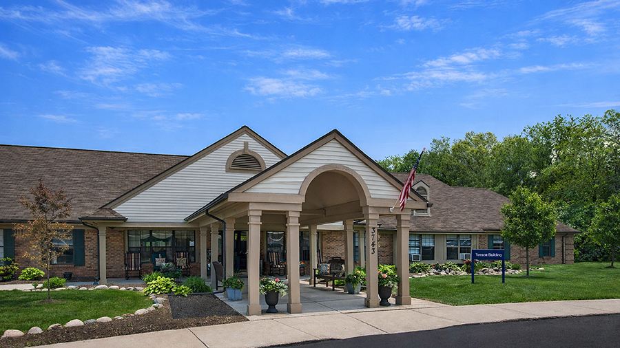 Front entrance at American House Village of Rochester Senior Living Community in Rochester Hills, MI