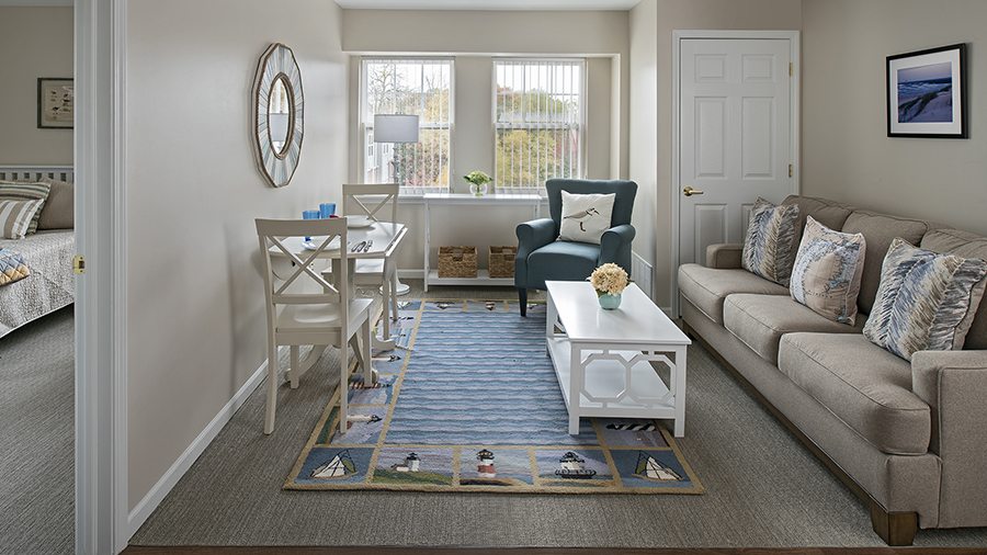 Model living room at American House Village of Rochester Senior Living Community in Rochester Hills, MI