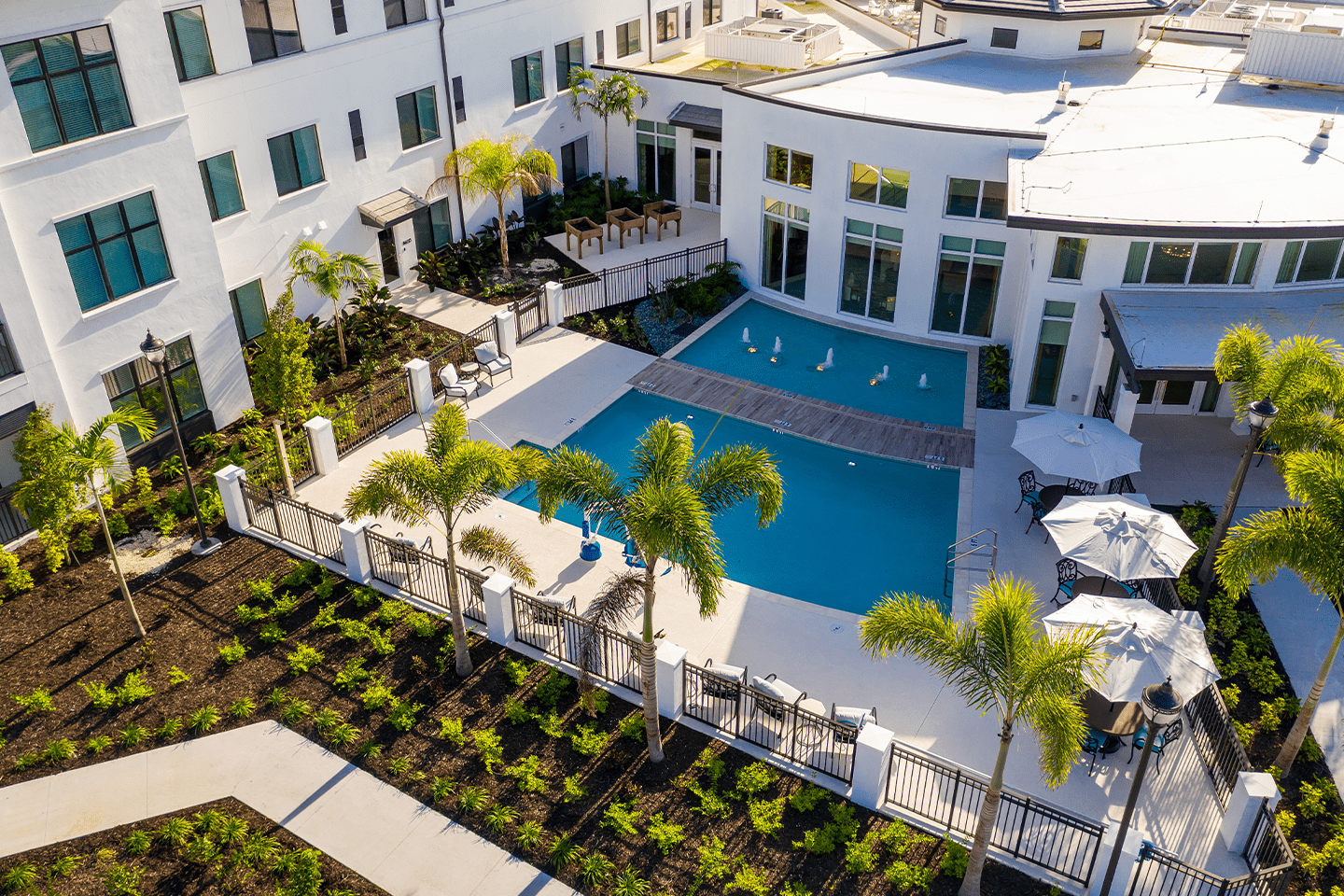Aerial view of pool American House Naples assisted living and memory care facility