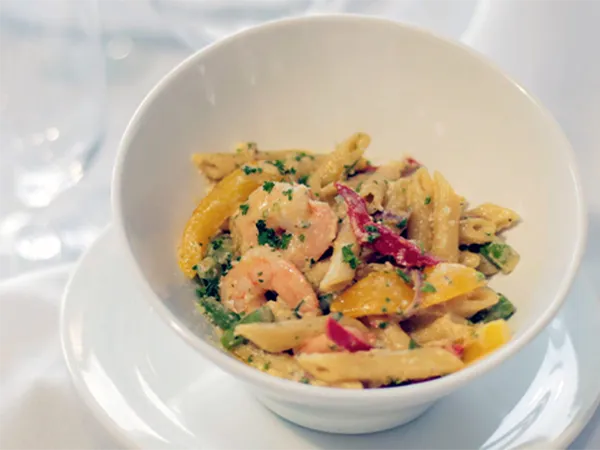 Pasta with shrimp served by the American House Senior Living culinary team. A healthy dining option.